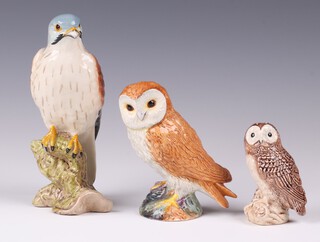 A Beswick figure of a kestrel 16cm together with 2 Beswick figures of owls 11cm and 8cm 