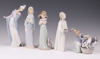 Five Lladro figures - Bashful Bather 5455 11cm, Don't Forget Me 5743 20cm, The Flirt 5789 23cm, girl standing with lilies 11E 23cm and girl standing with chamber stick D-240 20cm (candle damaged) 
