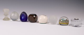 A BBC 1 etched glass circular paperweight in the form of a globe 7cm and a collection of paperweights -  etched glass in the form of a dice, a multi caned, 1 with black Jasper Ware bust to the centre, 1 in the form of a weight marked Pounderax, an opaque glass, a blue glass and 1 other decorated the all seeing eye 
