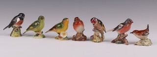 Seven Beswick figures of birds Robin 980, Chaffinch 991, Green Finch 2105, Gold Finch 2273, Wren 993 and 2 others (1 cracked) 