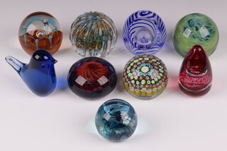 Three Caithness paperweights - May Dance (some light scratches to base), Optix U8398 and a blue paperweight marked Caithness, a red Wedgwood paperweight, 1 other Wedgwood in the form of a bird, a Mdina paperweight and 2 others 