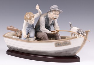 A Lladro porcelain figure group "Fishing with Gramps"  number 5215  40cm 