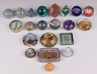 A Channel Islands glass paperweight 5cm, a Kerry glass paperweight 6cm and 19 other paperweights 