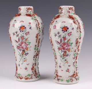 A pair of 19th Century Chinese famille rose export vases with rat, floral and vinous decoration 24cm 
