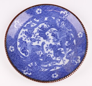 A 19th Century Japanese blue and white charger decorated birds 31cm 