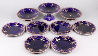 A Victorian 9 piece blue and gilt banded dessert service, the base marked 1686, comprising tall comport, 2 squat shaped comports and 6 plates 