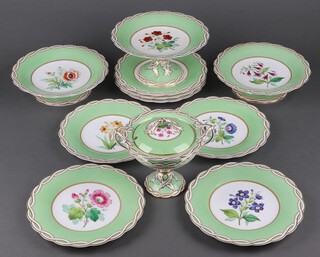 A Minton 11 piece apple green dessert service with floral decoration, the base numbered 9358 comprising twin handled tureen and cover (crack to the interior), tall comport (cracked), 2 squat comports (1 scratched to the decoration) and 8 plates (2 cracked) 