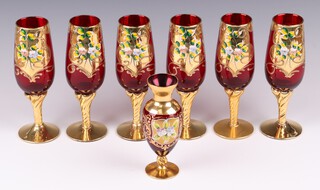 Six Murano red and gilt glass champagne flutes together with a spill vase 14cm 