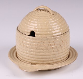 A 19th Century Wedgwood creamware honey pot in the form of a beehive, the base impressed Wedgwood 8cm 