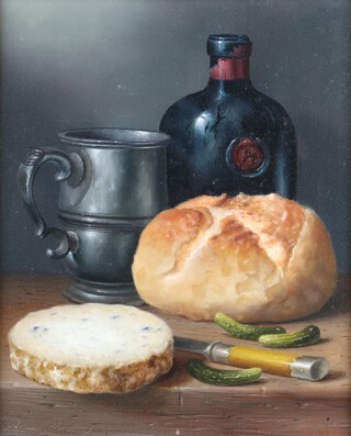 **Brian Davies (British, 1942-2014), Still Life with Bread, Tankard, Stilton, Port Bottle and Gherkins, oil on canvas, signed, 30cm x 24cm, within a swept gilt composition frame.**Please note Artists Resale Rights may be payable upon this lot