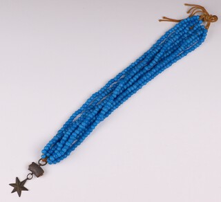 A multiple string of blue Eastern hardstone beads 