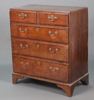 An 18th Century oak crossbanded chest of 2 short and 3 long drawers, raised on bracket feet 106cm h x 91cm w x 49cm d