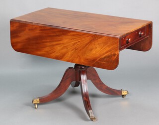 A Victorian mahogany pedestal Pembroke table, raised on a turned column and tripod base with brass caps and casters 70cm h x 102cm w x 50cm d 