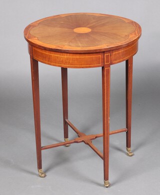 An Edwardian circular inlaid and crossbanded mahogany occasional table, the top inlaid 8 radiated panels, raised on square tapered supports with H framed stretcher, brass caps and casters 71cm h x 72cm w c 55cm d  
