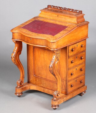 A Victorian figured walnut Davenport of serpentine outline, the raised stationery box to the back with pierced 3/4 gallery, the interior fitted pigeon holes, the pedestal 4 drawers, raised on cabriole supports 87cm h x 55cm w x 55cm d 
