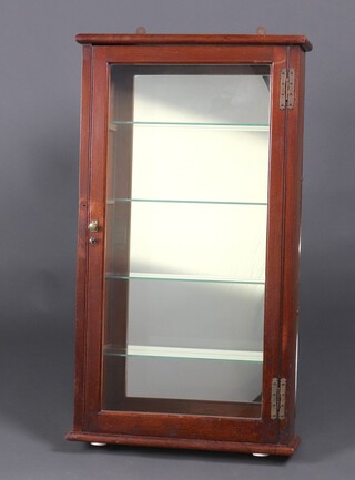 A Victorian shallow wall display cabinet fitted a later mirror and glass shelves 100cm h x 56cm w x 16cm d 