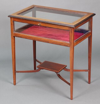 An Edwardian rectangular inlaid mahogany bijouterie table, raised on square tapered supports with undertier 69cm h x 67cm w x 43cm d 