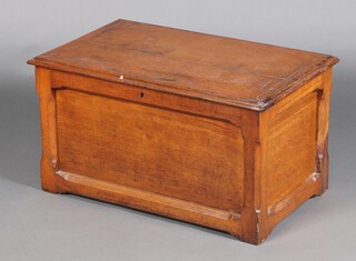 A 19th Century small oak coffer of panelled construction with hinged lid 42cm h x 79cm w x 49cm d 