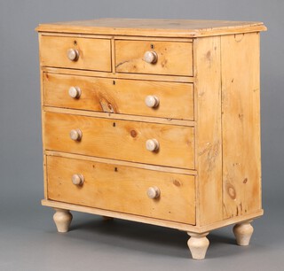 A Victorian pine chest fitted 2 short and three long drawers with tore handles raised on turned supports 95h x 93w x 44d