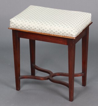 An Edwardian mahogany stool with upholstered seat, raised on square tapered supports with X framed stretcher 51cm h x 44cm w x 30cm d (slight stain to seat) 