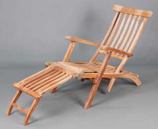A bleached slatted hardwood folding steamer chair