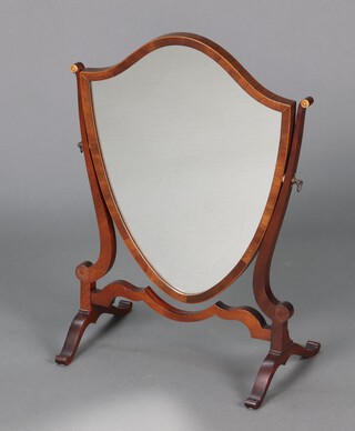 A 19th century style shield shaped dressing table mirror contained in a mahogany swing frame 55cm h x 36cm w x 24cm d