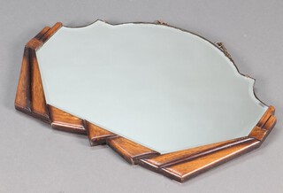 A 1930's Art Deco arch shaped plate mirror contained in a part oak frame 53cm h x 78cm w