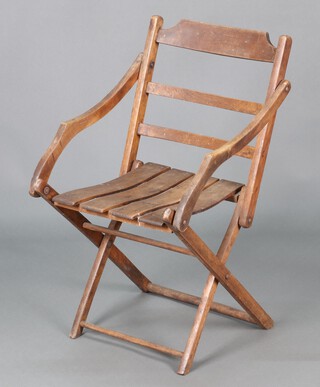 An Edwardian beech framed folding chair 81cm h x 47cm w x 45cm d