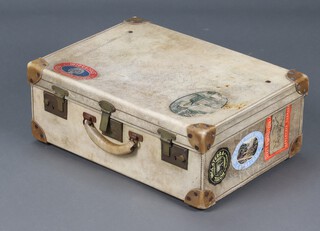 A 1950's Parchment suitcase with brass fittings 21cm h x 56cm w x 42cm d