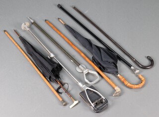 Two metal framed shooting sticks, four walking sticks, a parasol and an umbrella (8)