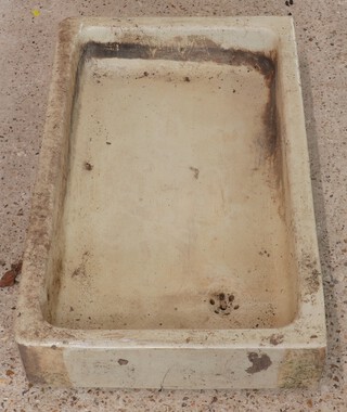 A rectangular shallow sink 15cm h x 90cm w x 56cm d 