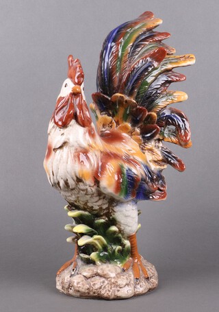 A large pottery figure of a standing cockerel 45cm h