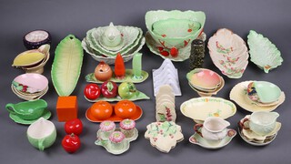 A Carltonware leaf shaped dish raised on lobster supports, two Carltonware toast racks, various Carltonware condiment sets, jugs, bowls, dishes etc (approx 46 items)