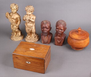 A Victorian rectangular mahogany trinket box 13h x 24w x 16d, a turned wooden bowl and cover, a pair of carved African portrait busts of gentleman, two gilt plastic figures of cherubs
