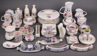 A Poole Pottery circular pedestal bowl, two Poole pottery ashtrays, a collection of various Poole pottery flower rings (approx 46 items)