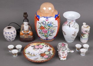 A Chinese ginger jar and cover 29cm, a hexagonal porcelain saki flask and six beakers together with a small collection of Oriental ceramics