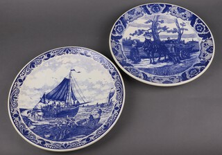A 20th century Delft charger decorated a ship and another decorated a horse and cart 39cm diameter 