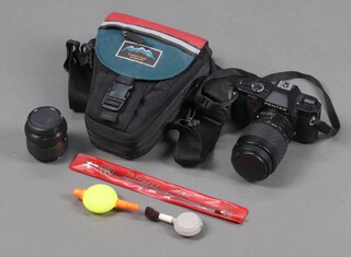 A Praktica P30 camera with a Sigma UC zoom 70-20MM 1:4-56 multi coated lens, a Praktica SMC zoom l1:3.5-4.5 35-70MM lens 