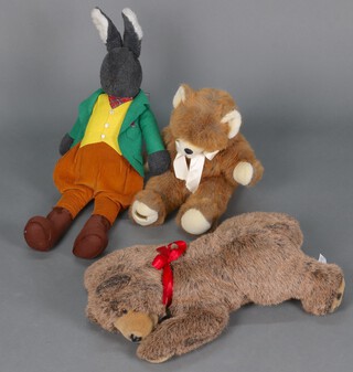 A Merrythought pyjama case in the form of a bear 44cm, a figure of a huntsman hare 74cm and a Merrythought figure of a reclining dog 8cm 