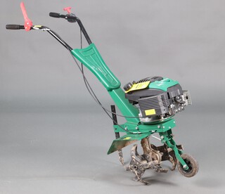 A Qualcast petrol rotovator 