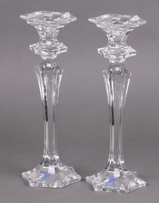 Silea, a pair of faceted pressed glass candlesticks 30cm h