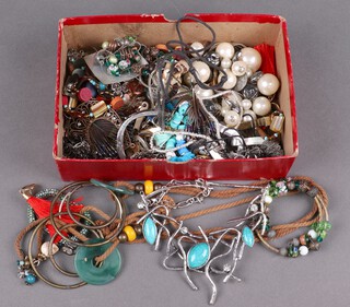 A collection of costume jewellery including beads