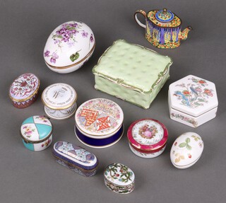 A shaped cloisonne enamel miniature teapot together with a small collection of trinket boxes 