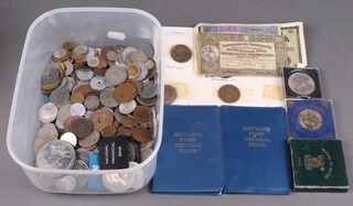 A collection of assorted coins and banknotes