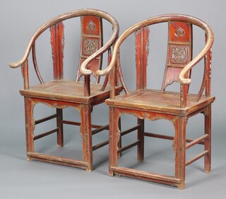 A pair of Chinese hardwood judgement seats with pierced slat backs 107cm h x 67cm w x 58cm d
