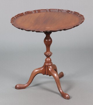 A Georgian style circular snap top wine table raised on pillar and tripod base 61cm h x 61cm  diam 