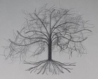 A pressed metal wall sculpture in the form of a tree 80cm x 73cm
