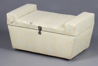 A 1930's Art Deco rectangular ottoman of waisted form with hinged lid 30cm h x 60cm w x 30cm d 