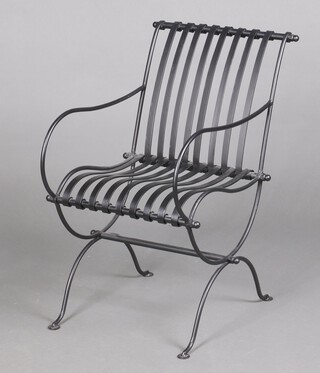 A metal garden armchair 75cm h x 48cm w x 48cm d 