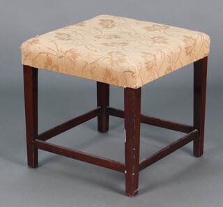 A 19th Century mahogany stool with upholstered seat on square tapered supports 37cm x 49cm x 50cm 